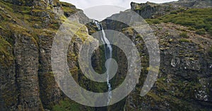 The second tallest Icelandic waterfall Glymur Majestic valley in Iceland, view of waterfall, rocks and stones