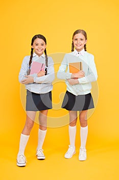 Secondary school. Schoolgirls tidy appearance school uniform. School friendship. Knowledge day. School day fun cheerful