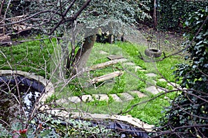 Secret english garden with a bench