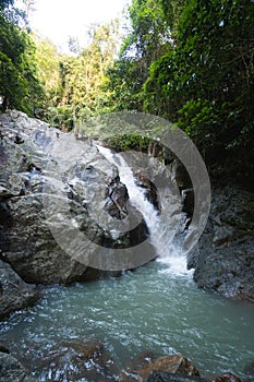 Secret tropical waterfall in jungle on a Samui island.