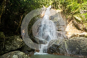 Secret tropical waterfall in jungle on a Samui island.