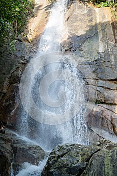 Secret tropical waterfall in jungle on a Samui island.