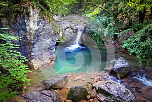 Secret waterfall in a jungle photo