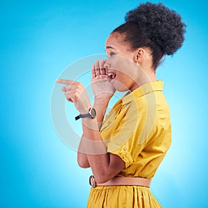 Secret, whisper and black woman hand pointing in studio for with news or info on blue background. Confidential