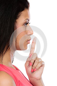 Secret woman. Girl showing hand silence sign