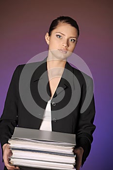 Secretary or business woman with folders of papers