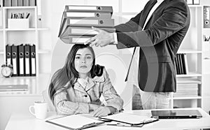 secretary with many folders. modern office life. woman and man do business. businessman consulting with colleague. make