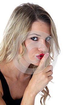 Secretive Frightened Young Woman With Finger to Lips