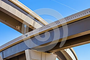 Section of elevated higway with several levels against a bright
