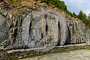 A section of a mountain with visible layers