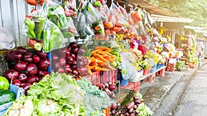 Section of sale of vegetables, fruits and flowers on a road in Jinotega, Nicaragua, Central America photo