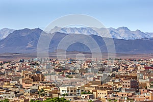 A section of the village of Tinerhir in Morocco with the magnificent High Atlas Mountains in the background.