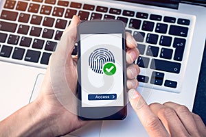 Secure access granted by valid fingerprint scan, cyber security on internet with biometrics authentication technology on mobile