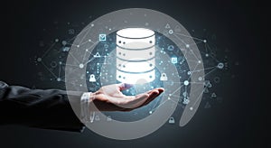 Secure Database Network: Hand Presenting Glowing Server Icon with Connections