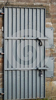 Secure grey door on a lock-up