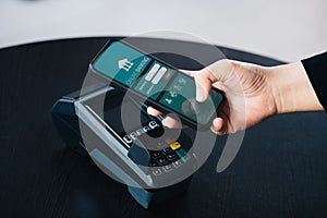 Secure payment technology concept and service charge, customers are using their phone to pay using paywave technology by