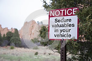 Secure valuables in your car vehicle sign