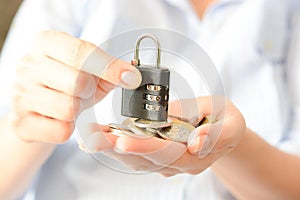 Secure your savings concept with cipher lock and money