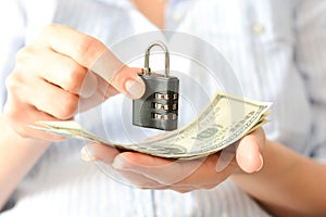 Secure your savings concept with cipher lock and money photo