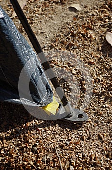 Securing a camping tent to the ground