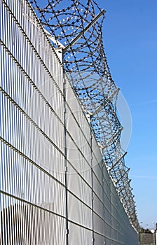 Security boundary barbed fence photo