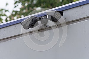 Security camera on building