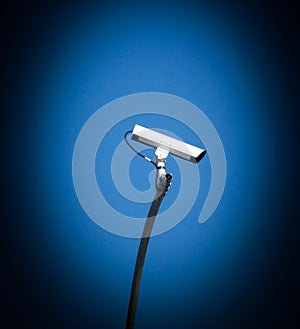 Security camera, CCTV on blue sky background