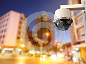 Security camera or cctv camera with cityscape background