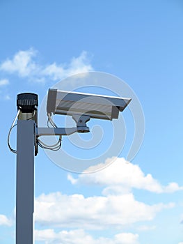 Security camera cctv over blue sky