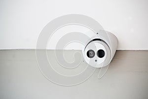 Security camera with eyes and mouth
