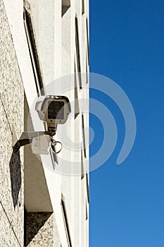 Security camera mounted on the building wall