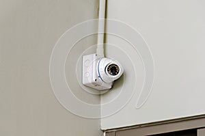 Security Camera Mounted on Wall for Surveillance