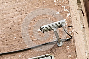 Security camera mounter on wall