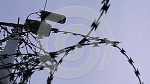 Security camera and razor wire