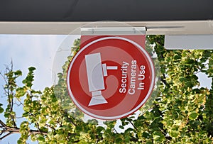 Security camera in use sign