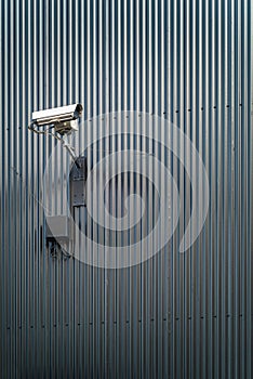 Security camera on a wall