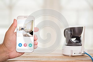 Security camera on Wood table. IP Camera