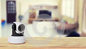 Security camera on Wood table. IP Camera
