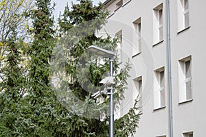 Security cameras mounted on LED lamp post