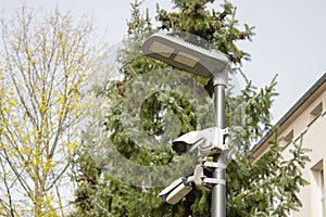 Security cameras mounted on LED lamp post