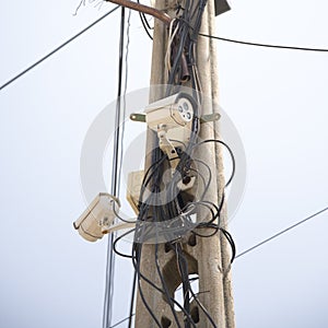 Security CCTV Cameras on a lamp post in the park.