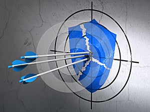 Security concept: arrows in Broken Shield target