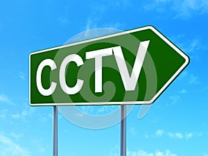 Security concept: CCTV on road sign background
