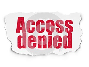 Security concept: Access Denied on Torn Paper background
