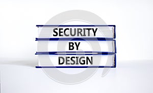 Security by design symbol. Concept words Security by design on books on a beautiful white table white background. Business