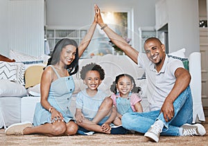 Security, family and portrait of parents and children on floor bonding, quality time and relax in living room. New home