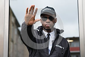 Security Guard Making Stop Gesture