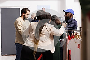 Security guard manage crowd of shoppers