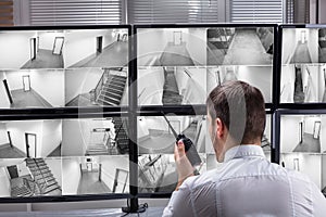 Security Guard Monitoring CCTV Footage