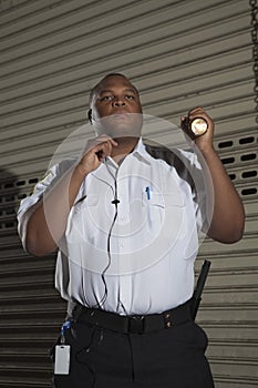 Security Guard Patrols At Night photo